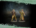 Two detailed miniatures stand on a textured base, representing characters from the Cosmic Horror game. On the left, a figure in a brown jacket and hat holds a pistol, while the right figure, dressed in a long beige coat and fedora, brandishes a revolver. The background features a dark, moody atmosphere, enhancing the supernatural horror theme of the game.